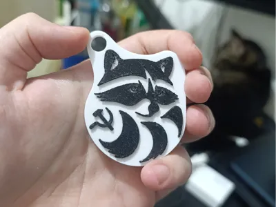 Communist raccoon keychain