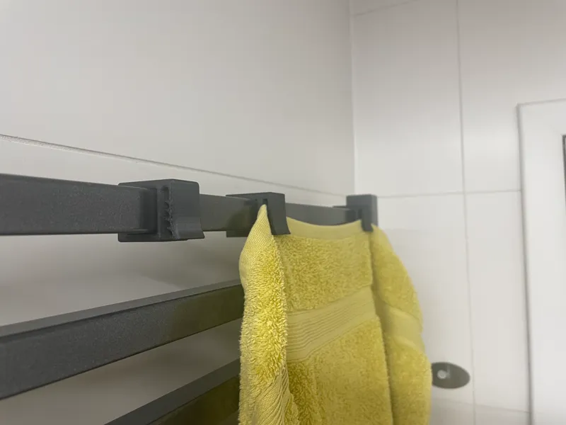 Towel holder for bathroom radiator