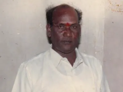 Indian idol man in dress