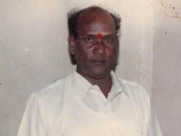 Indian idol man in dress