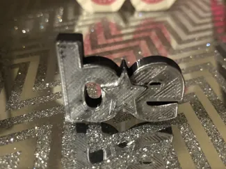 Billie Eilish B star E logo