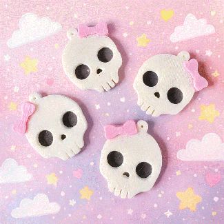Cute skull earrings with bows