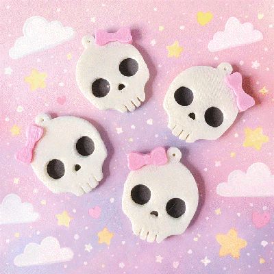 Cute skull earrings with bows