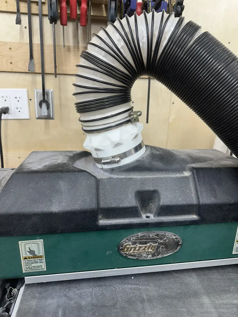 Simple 4" dust collector magnetic quick connect.