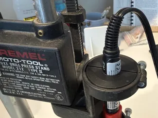 Soldering iron adapter for Dremel drill press