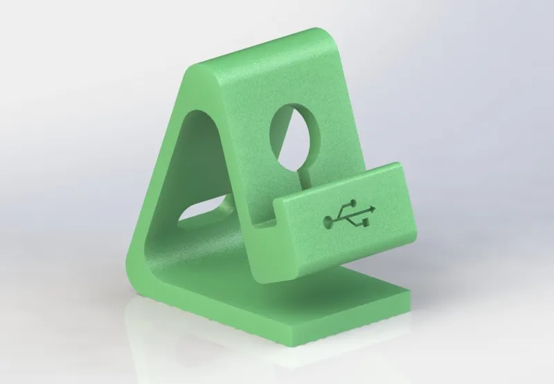 Phone stand with reversible charge cable