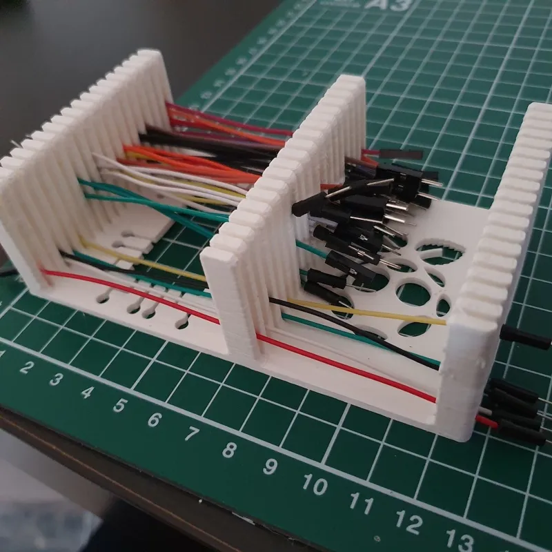Breadboard prototyping wire holder