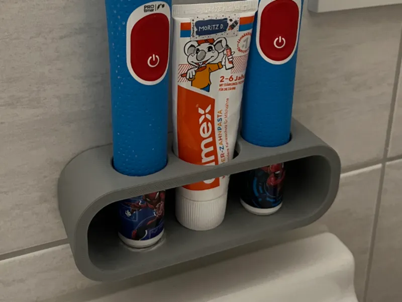 OralB Kids Wandhalter mit Zahnpasta