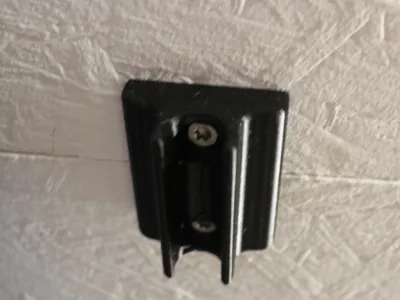 Wall mount for steam iron sleeve ironing board