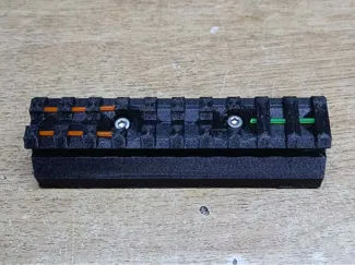 Picatinny Rail with integrated reflex sight