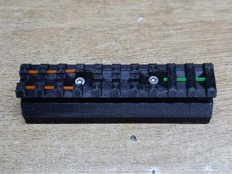 Picatinny Rail with integrated reflex sight