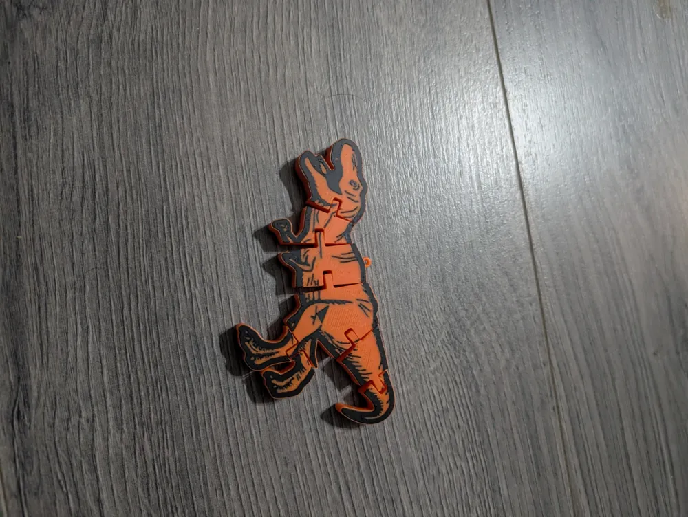 Flexi Dinosaur keychain - Free 3D Print Model - MakerWorld