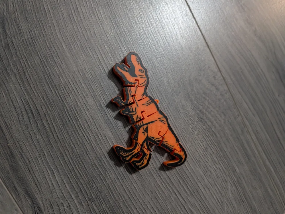 Flexi Dinosaur keychain - Free 3D Print Model - MakerWorld
