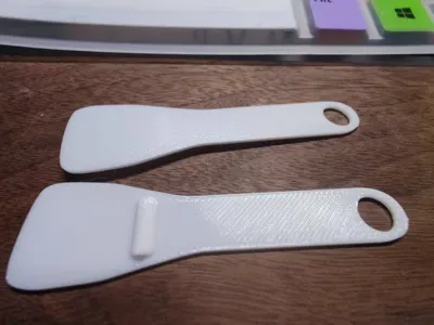 small scraper, palette knife, glue spreader