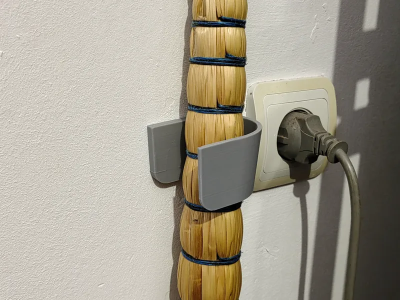 Minimalist broom holder