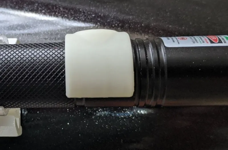 Safety button cover for Laser 303