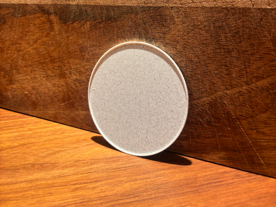 Slightly recessed minimalistic coaster  