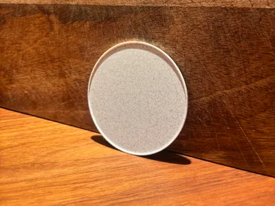 Slightly recessed minimalistic coaster  