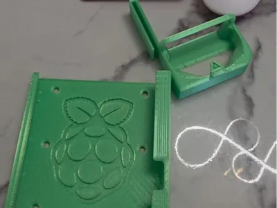 Raspberry Pi 400 with clip-on mouse attachment