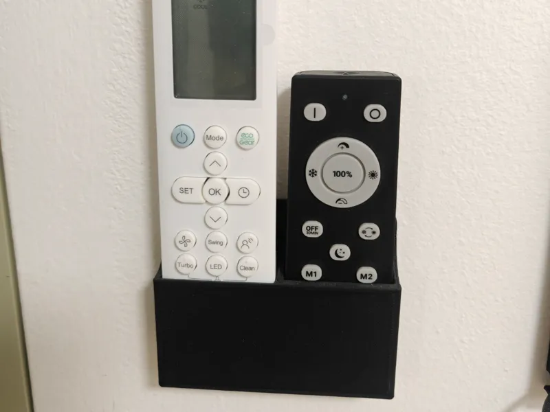 Wall holder for 2 remote controllers