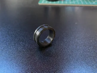 Ring with carved ring around it