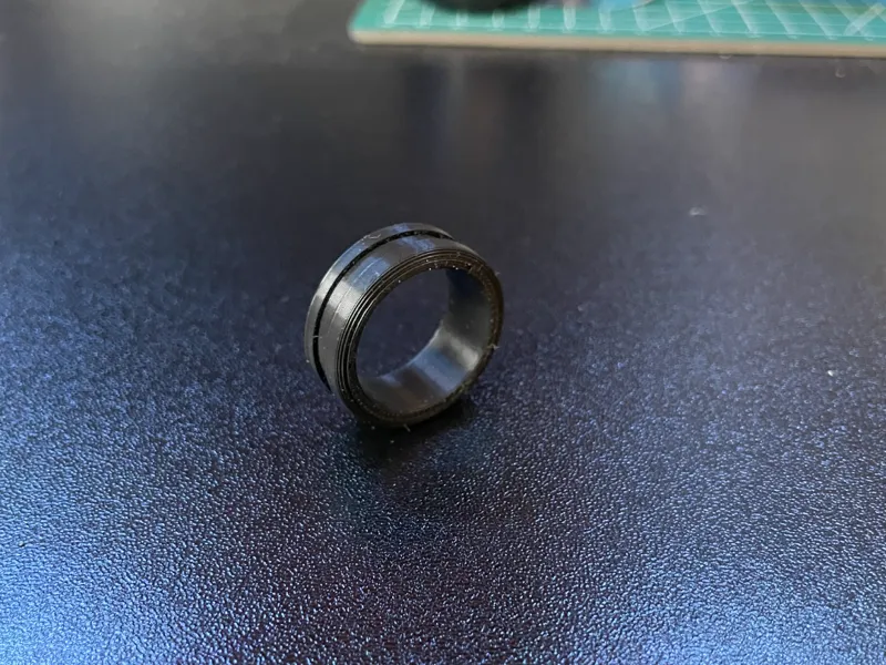 Ring with carved ring around it