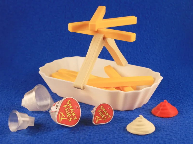 Unbalanced French fries / chips balancing game