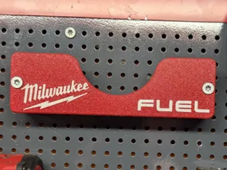 Wall hanger for Milwaukee angle grinder