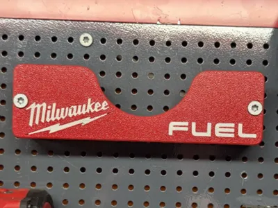 Wall hanger for Milwaukee angle grinder