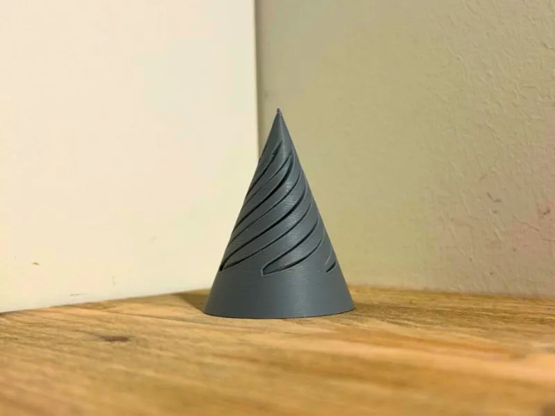 Passthrough vortrex fidget cone