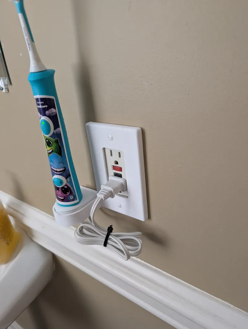 Outlet Cover With Philips Toothbrush Holder