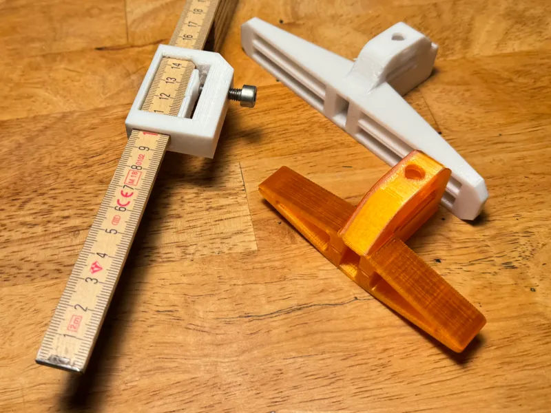 Parallel scriber/measuring line folding rule 