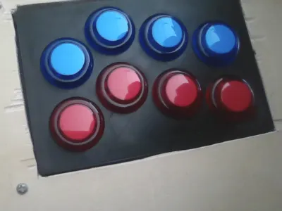 ergonomic button plate
