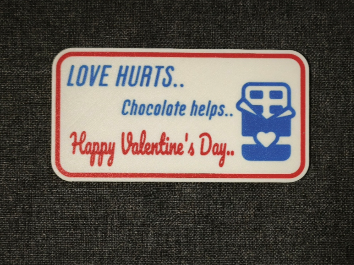 Funny Valentine’s Sign–Love hurts, chocolate helps