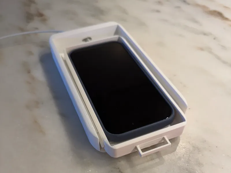 Under desk phone storage and charger