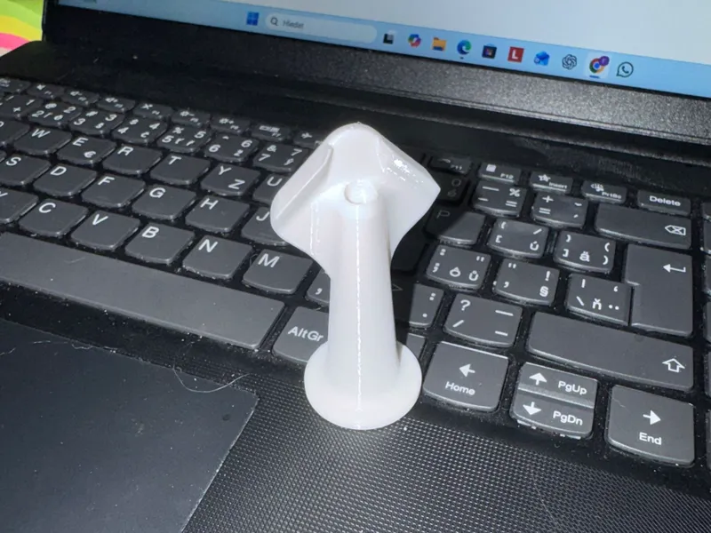 Silicone caulking nozzle with integrated smooter