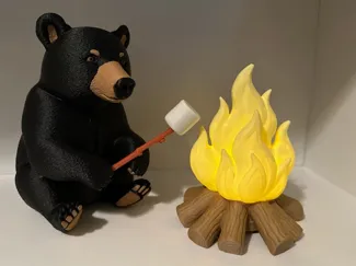 Black Bear By Tea Light Fire