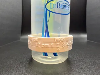 Dr. Brown's Bottle Date & Time Dial Ring
