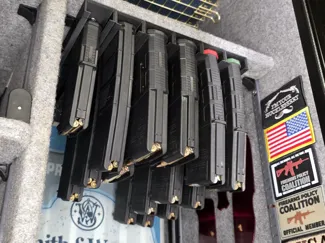 Under shelf magazine holder/rack