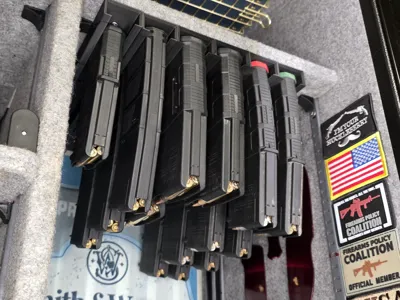 Under shelf magazine holder/rack