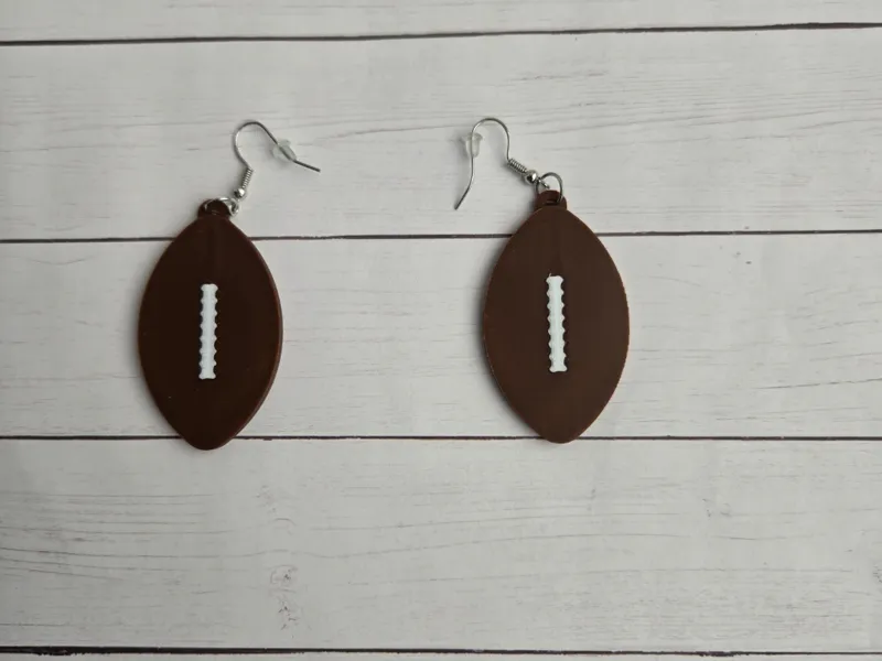 foot ball earrings