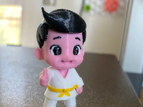 Piccolo Judoka con cintura gialla