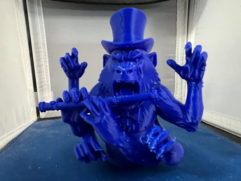 Blue Baboon with a flute-ignore the multiple arms