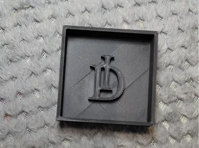 Little half a box. 60mm (12mm deep)