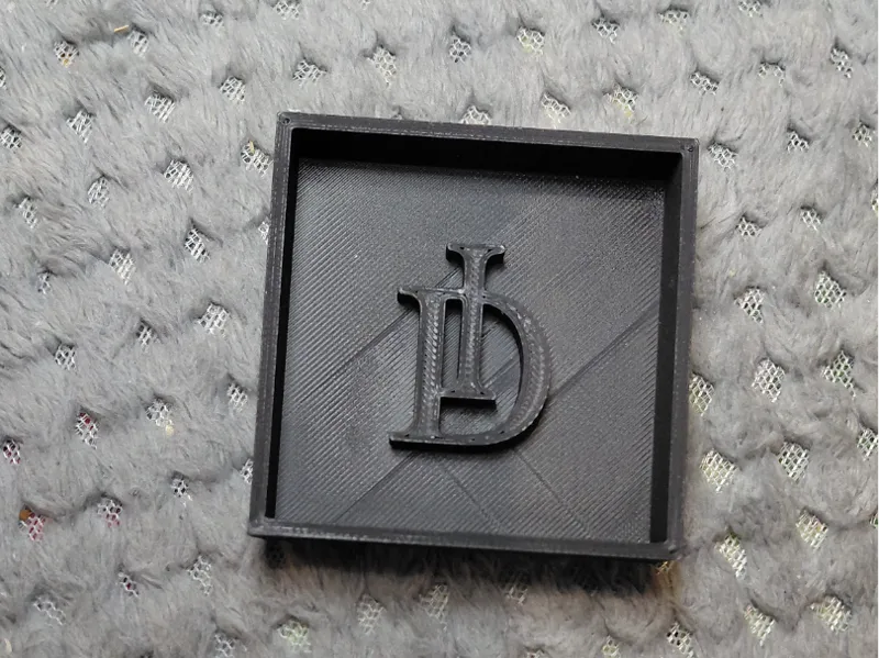 Little half a box. 60mm (12mm deep)