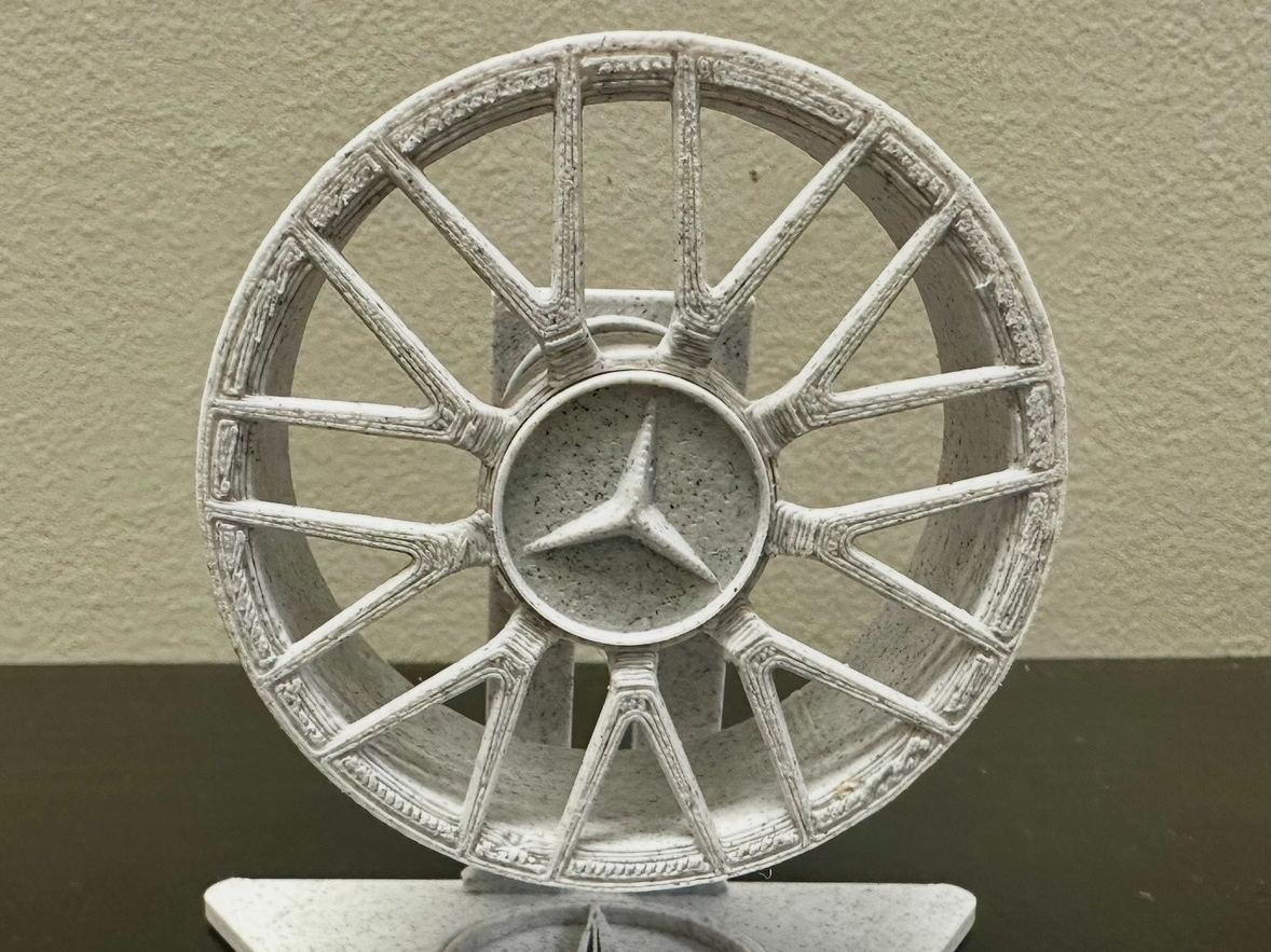 Mercedes AMG spinning rim stand