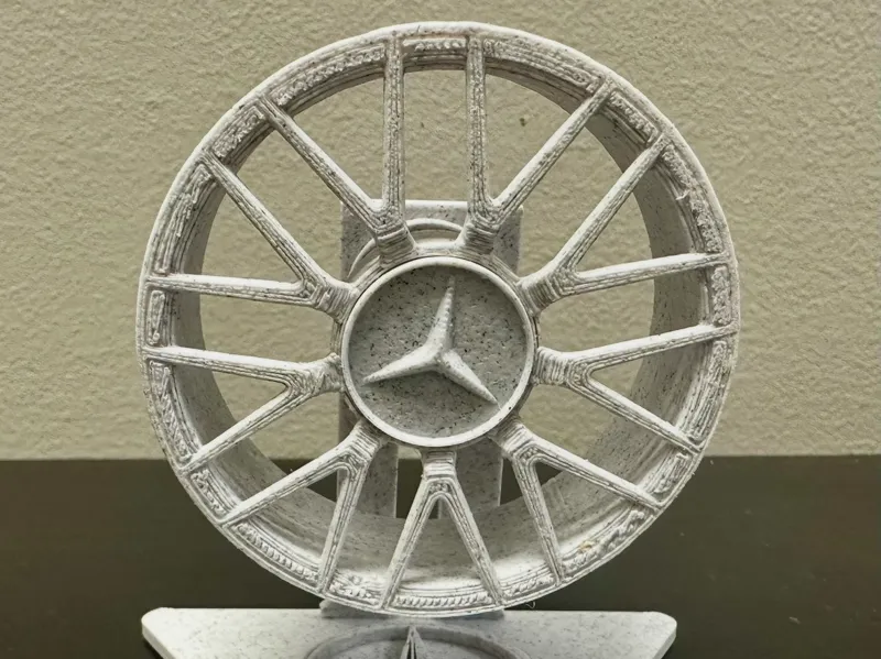 Mercedes AMG spinning rim stand