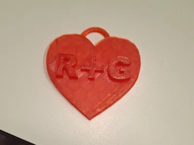 Heart-shaped initial keychain
