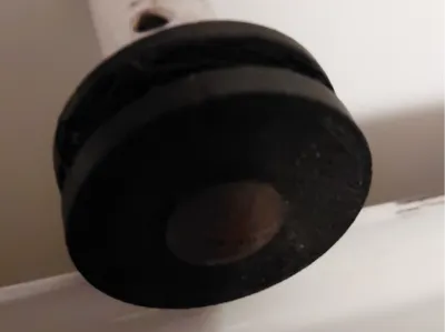 Heater holder for narrow bathroom radiator
