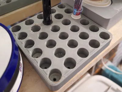 Oral A Electric toothbrush head holder